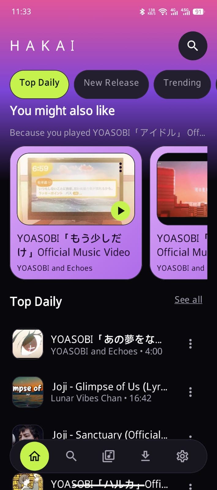 HakaiMusic home screen with Top Daily, New Release and Trending tabs, a "You might also like" row explaining which track it is based on, and a list of recommended songs above the floating navigation bar